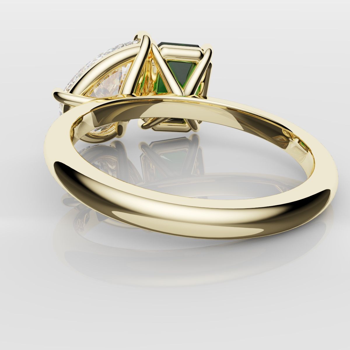 Emerald and Pear Diamond Two Stone Engagement Ring