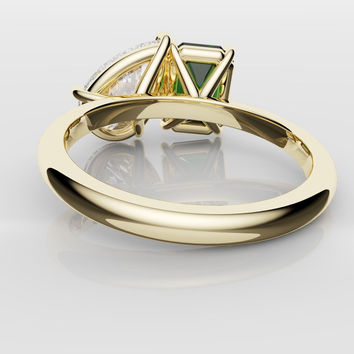 Emerald and Pear Diamond Two Stone Engagement Ring