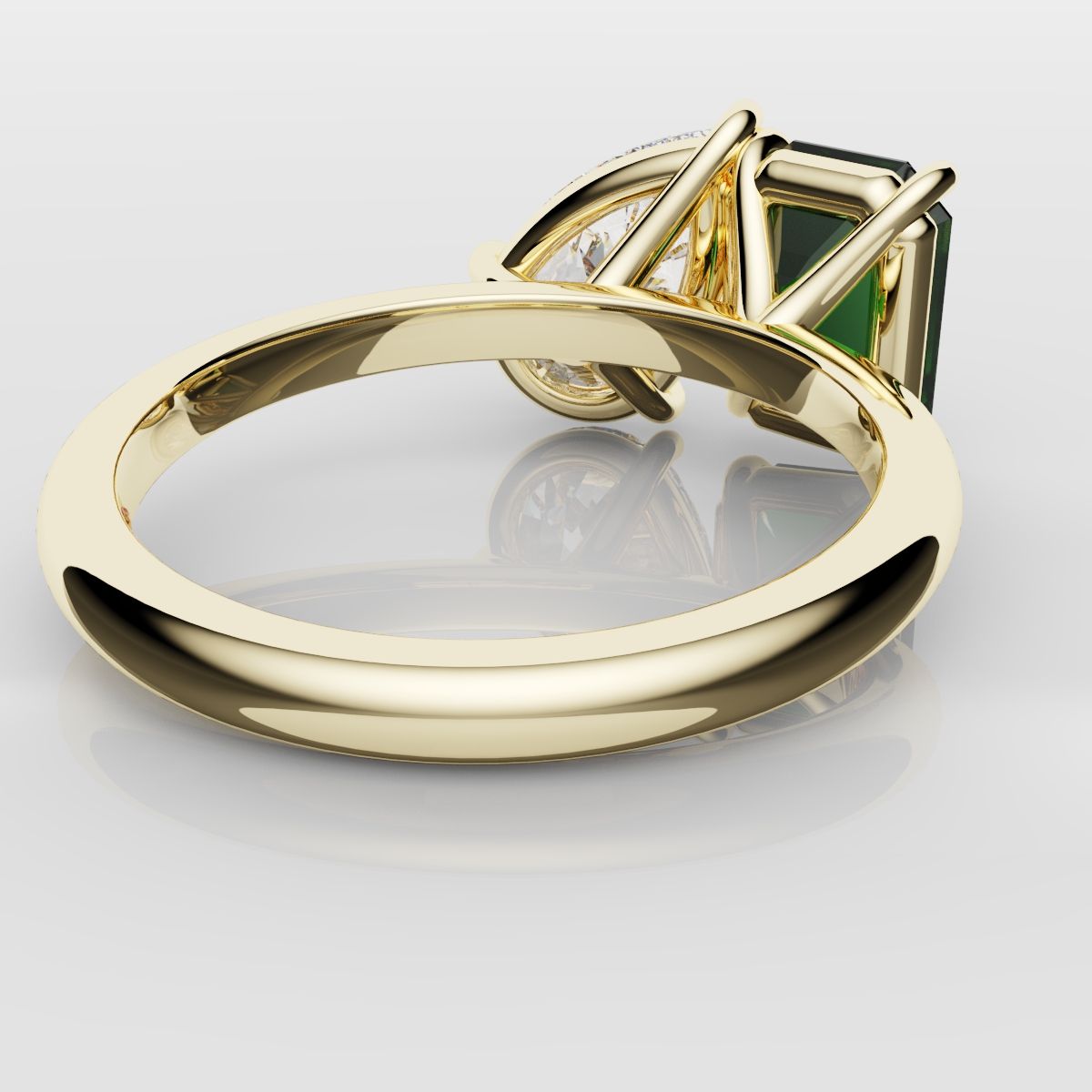 Emerald and Pear Diamond Two Stone Engagement Ring