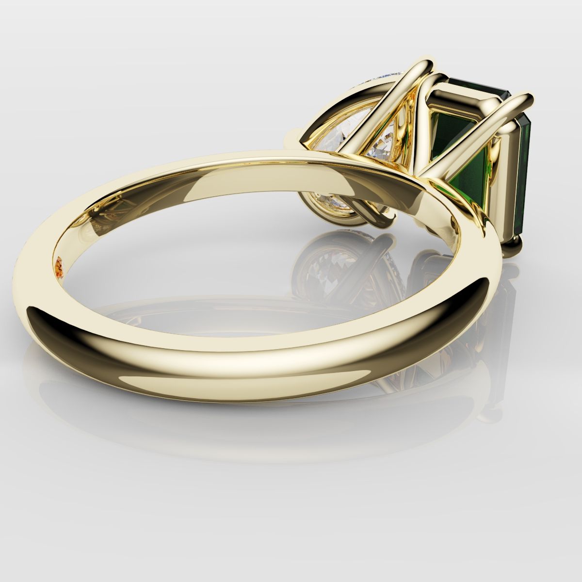 Emerald and Pear Diamond Two Stone Engagement Ring