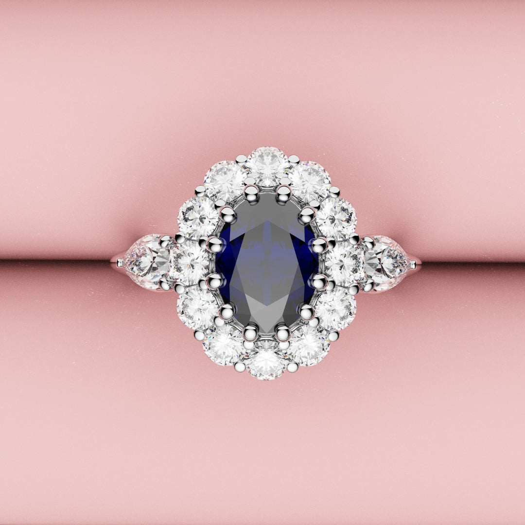 bespoke oval blue sapphire and diamond ring