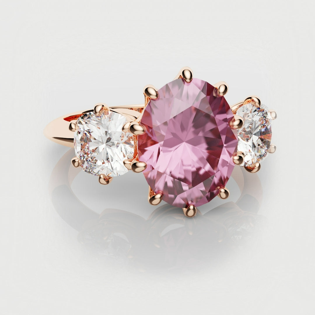 oval pink sapphire three stone engagement ring