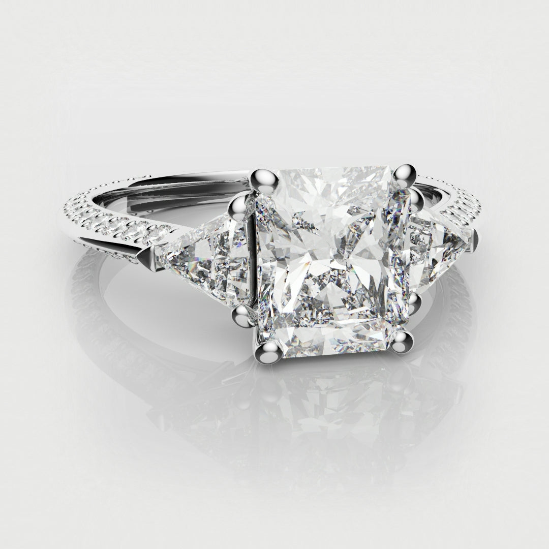 radiant and trilliant diamond three stone engagement ring