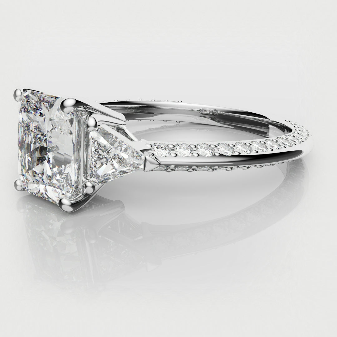 radiant and trilliant three stone engagement ring