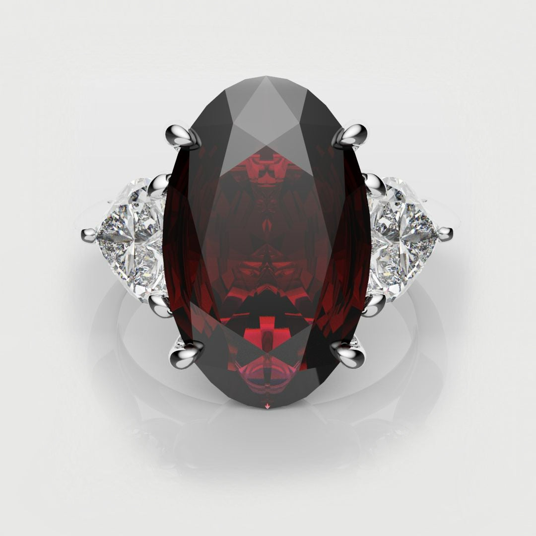 oval ruby trilogy engagement ring