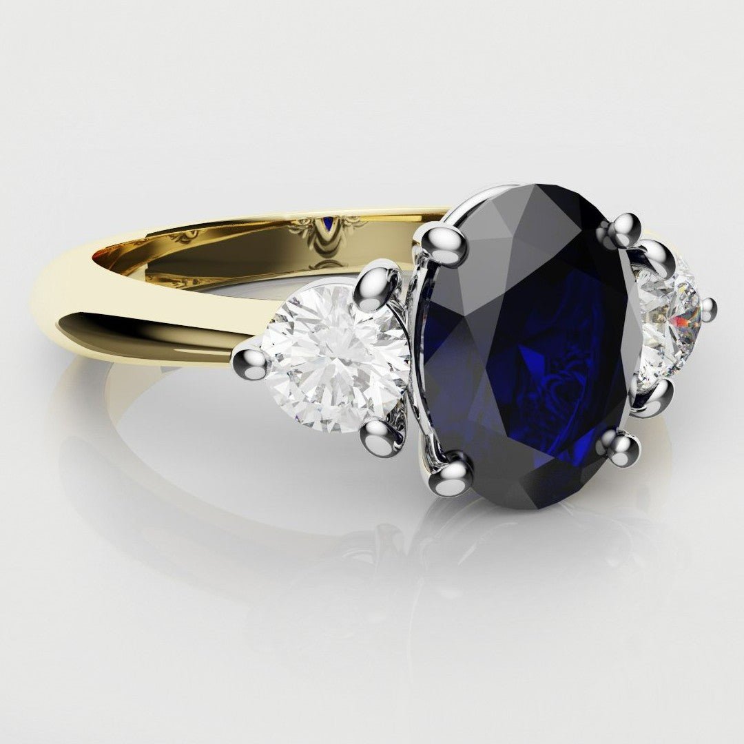 Oval Sapphire and Diamond Trilogy Engagement Ring