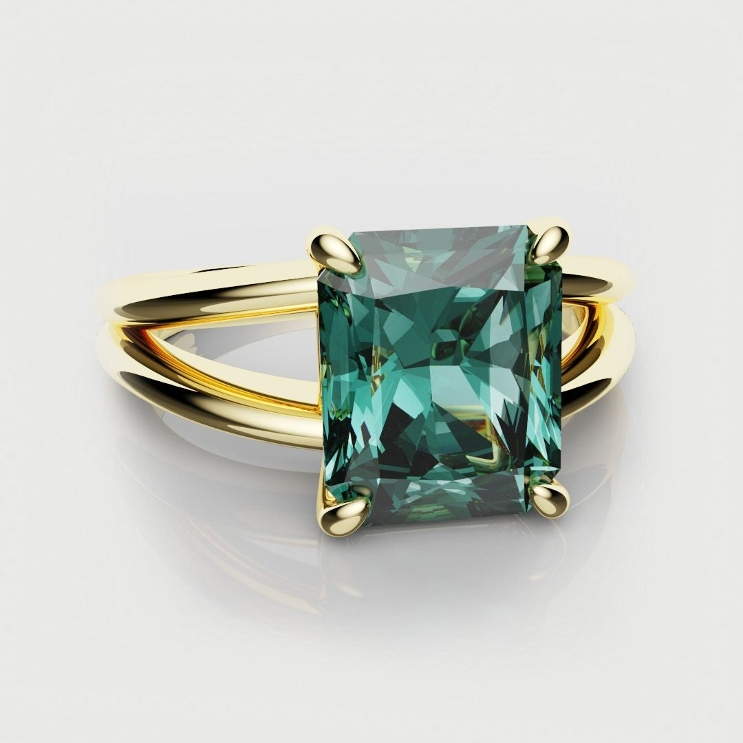 split shank solitaire teal sapphire engagement ring