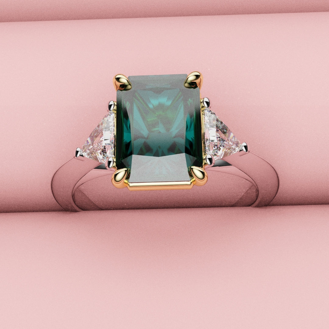 teal sapphire and trilliant diamond three stone engagement ring