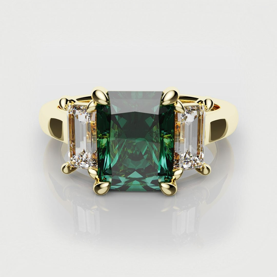 teal sapphire and baguette diamond trilogy engagement ring