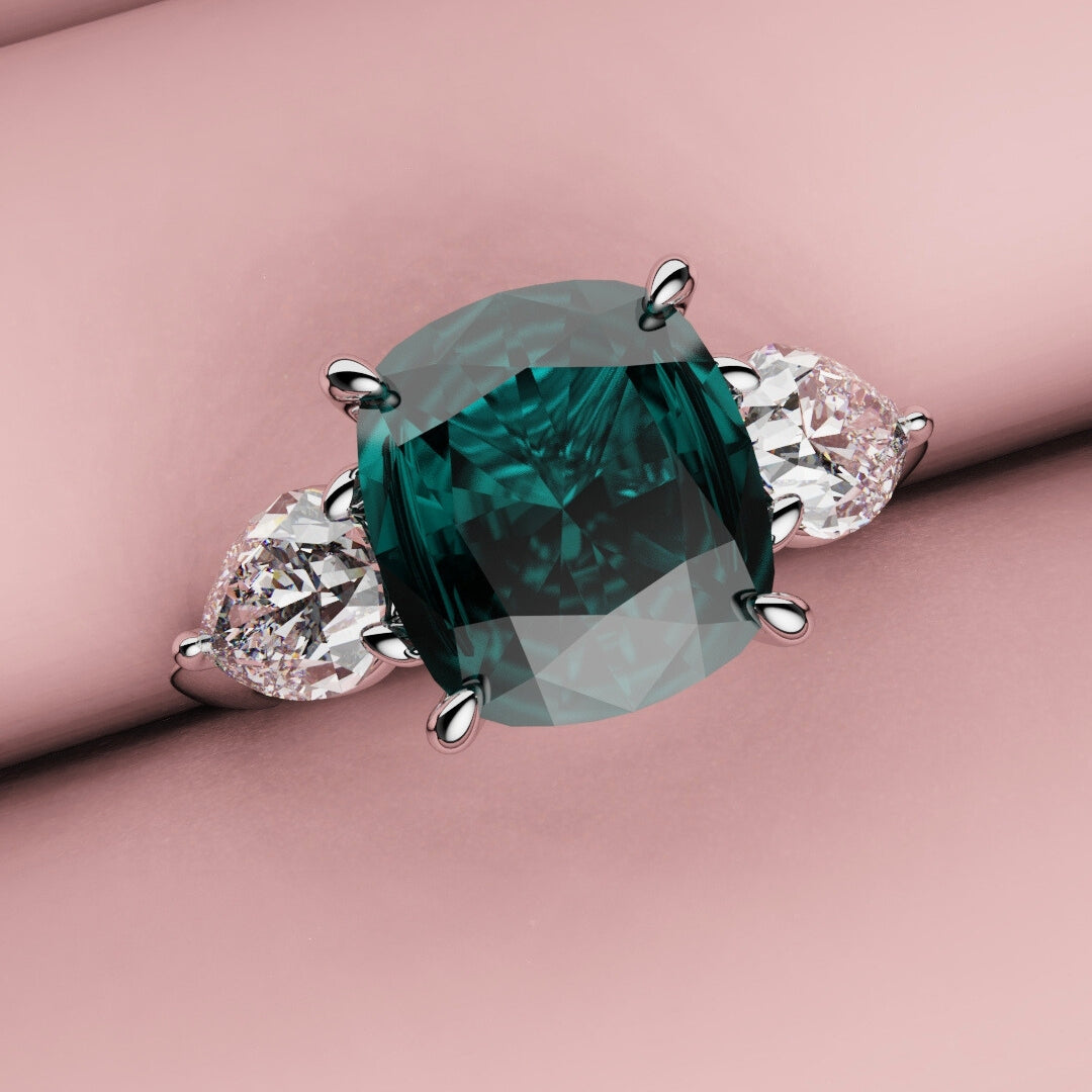teal sapphire and diamond three stone engagement ring