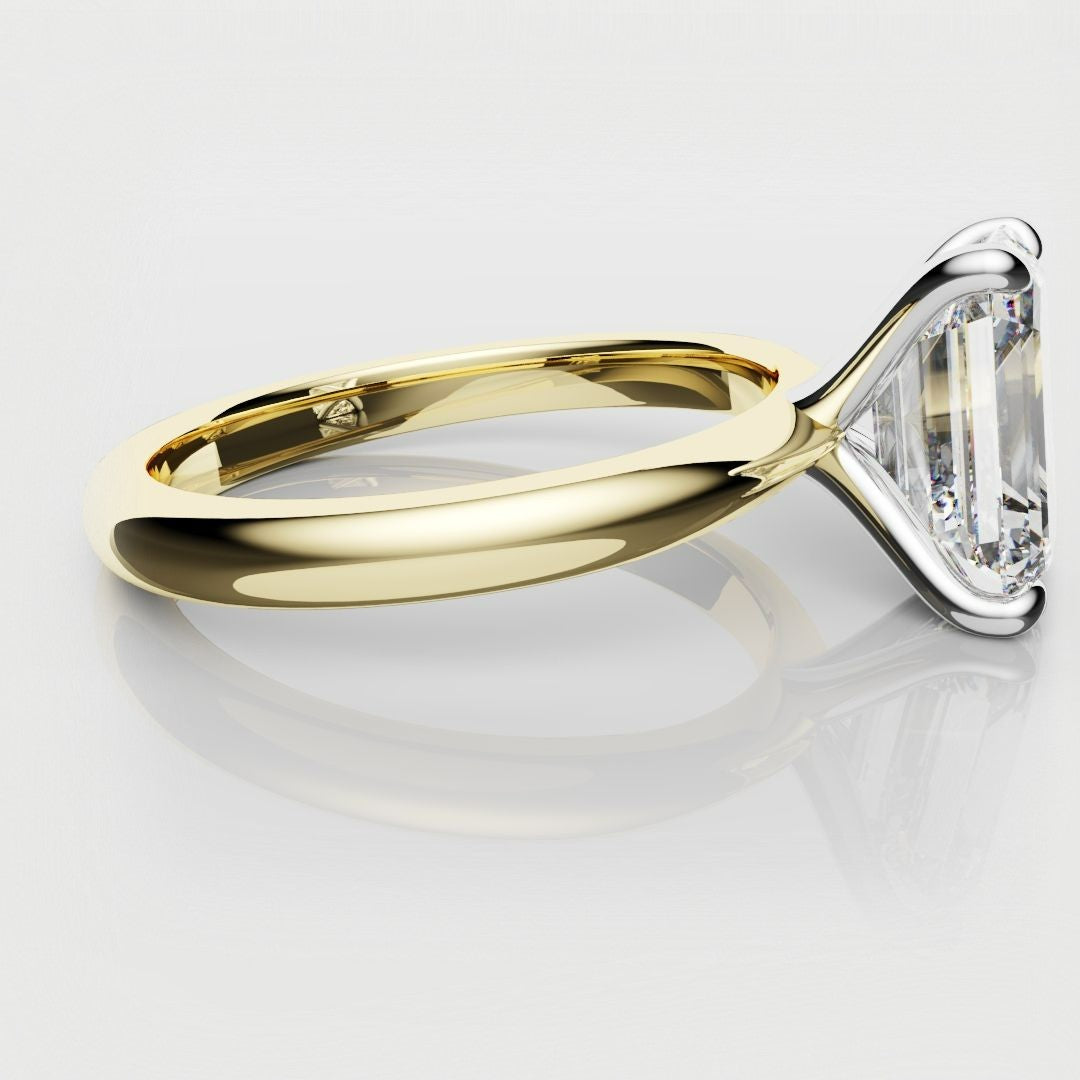 solitaire engagement ring with emerald cut center diamond