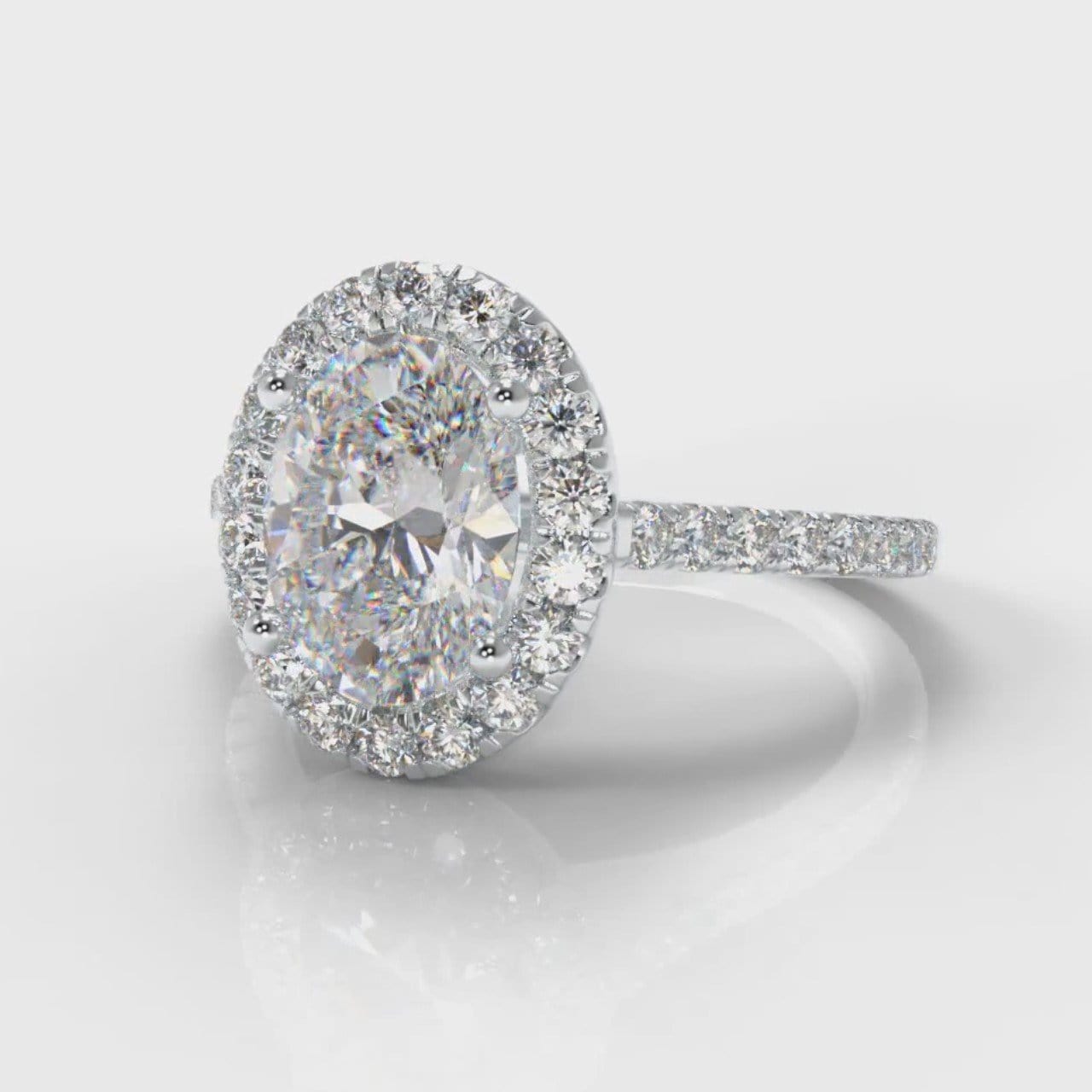 Petite Micropavé Oval Diamond Halo Engagement Ring