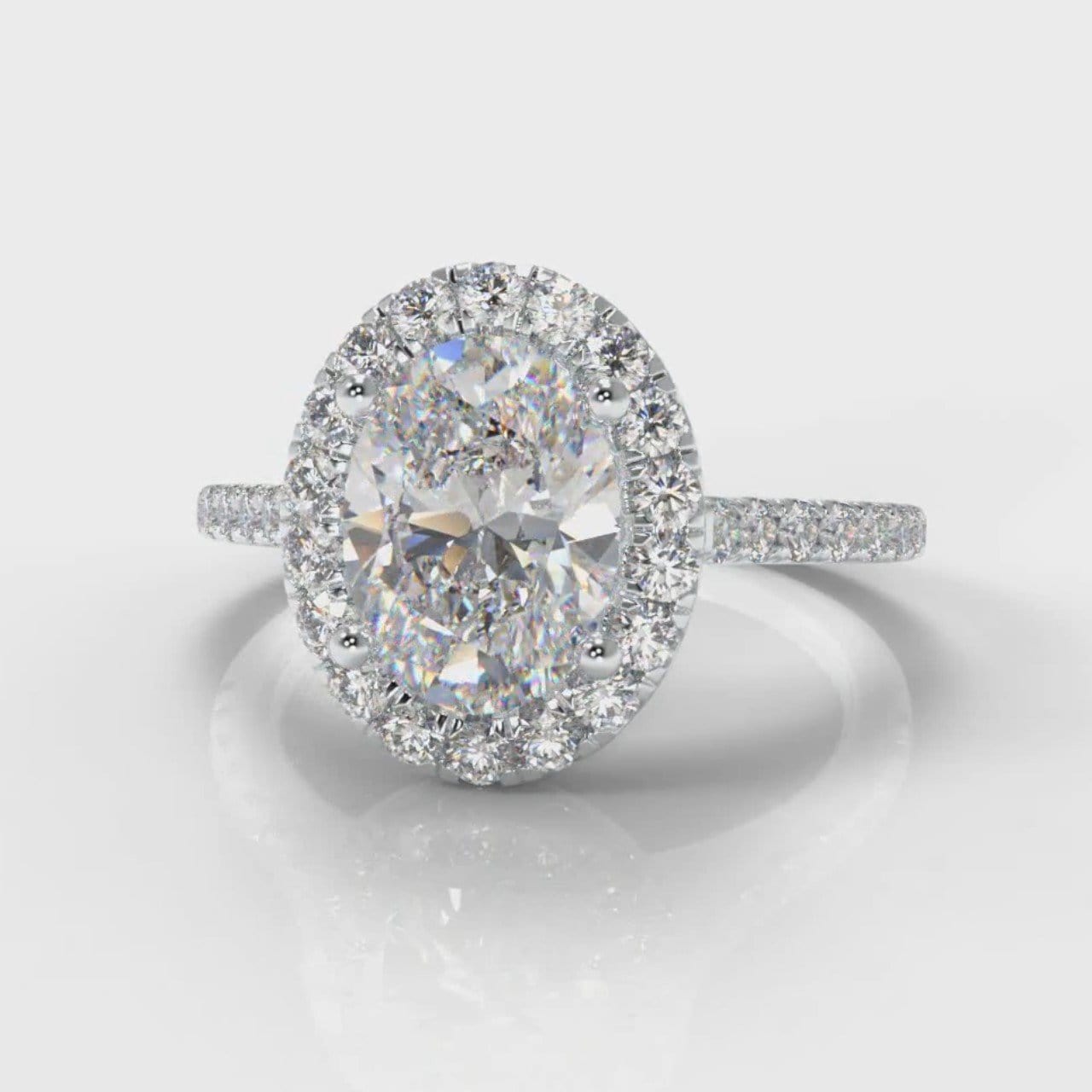 Petite Micropavé Oval Diamond Halo Engagement Ring