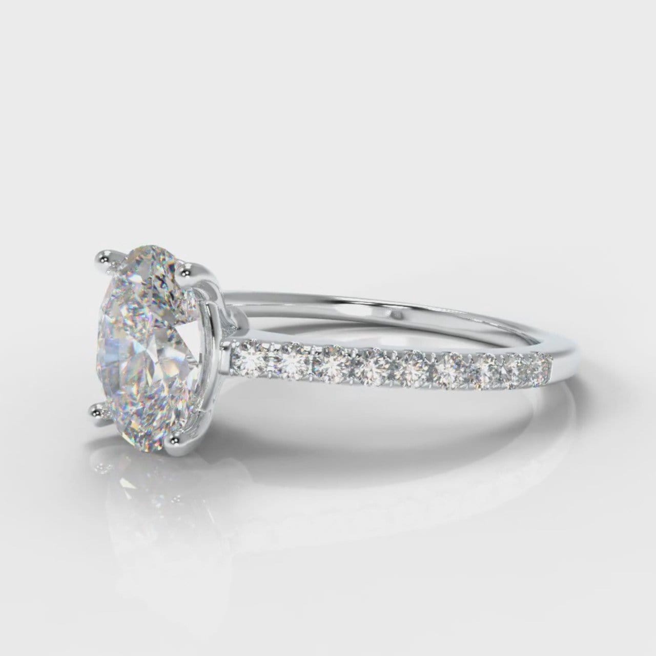 Petite Micropavé Oval Diamond Engagement Ring