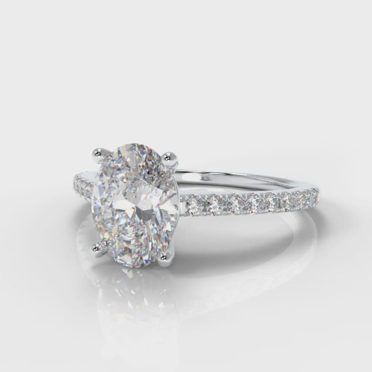 Petite Micropavé Oval Diamond Engagement Ring