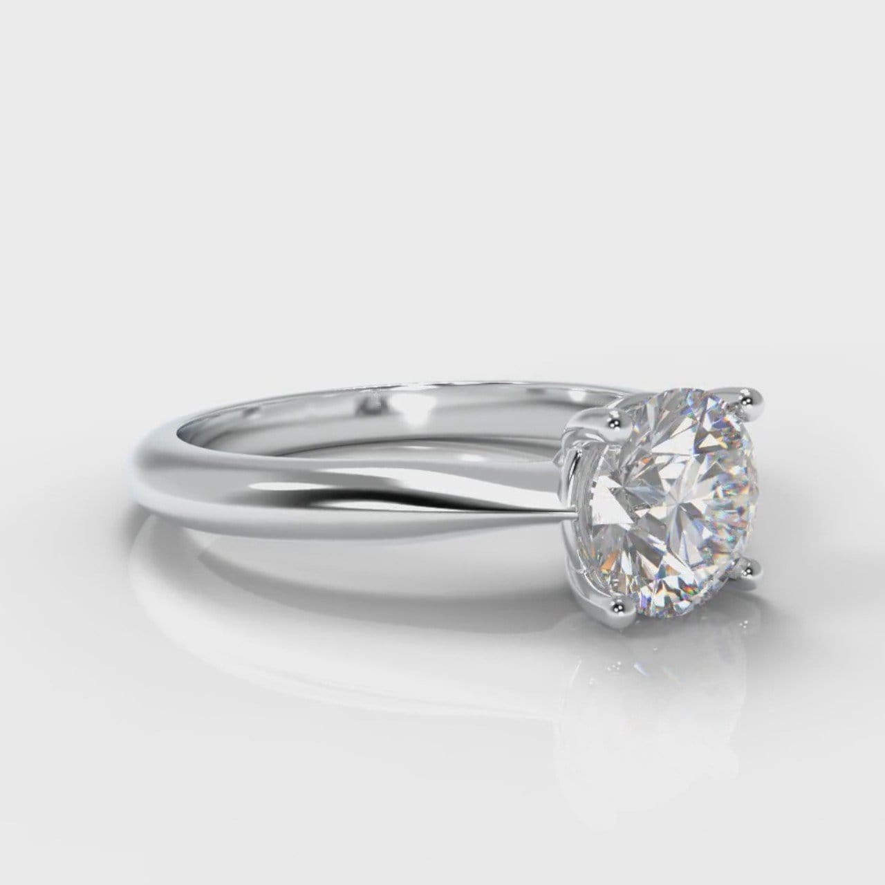 Carrée Solitaire Round Brilliant Engagement Ring