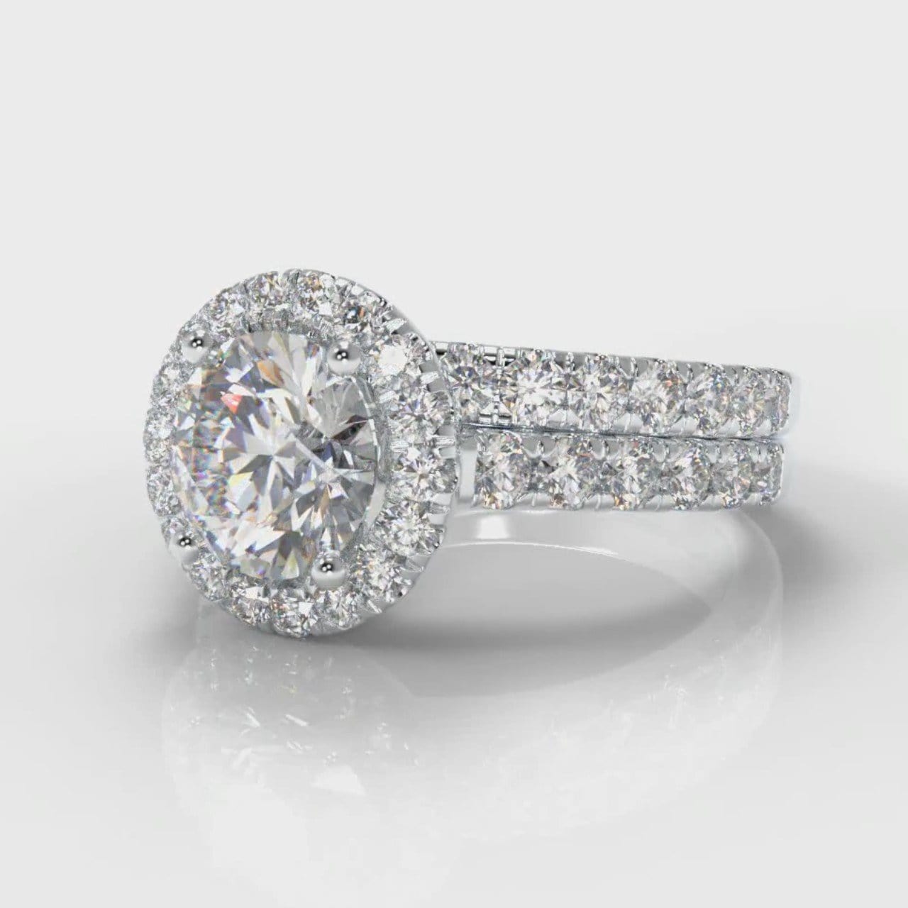 Micropavé Round Brilliant Cut Diamond Halo Bridal Set