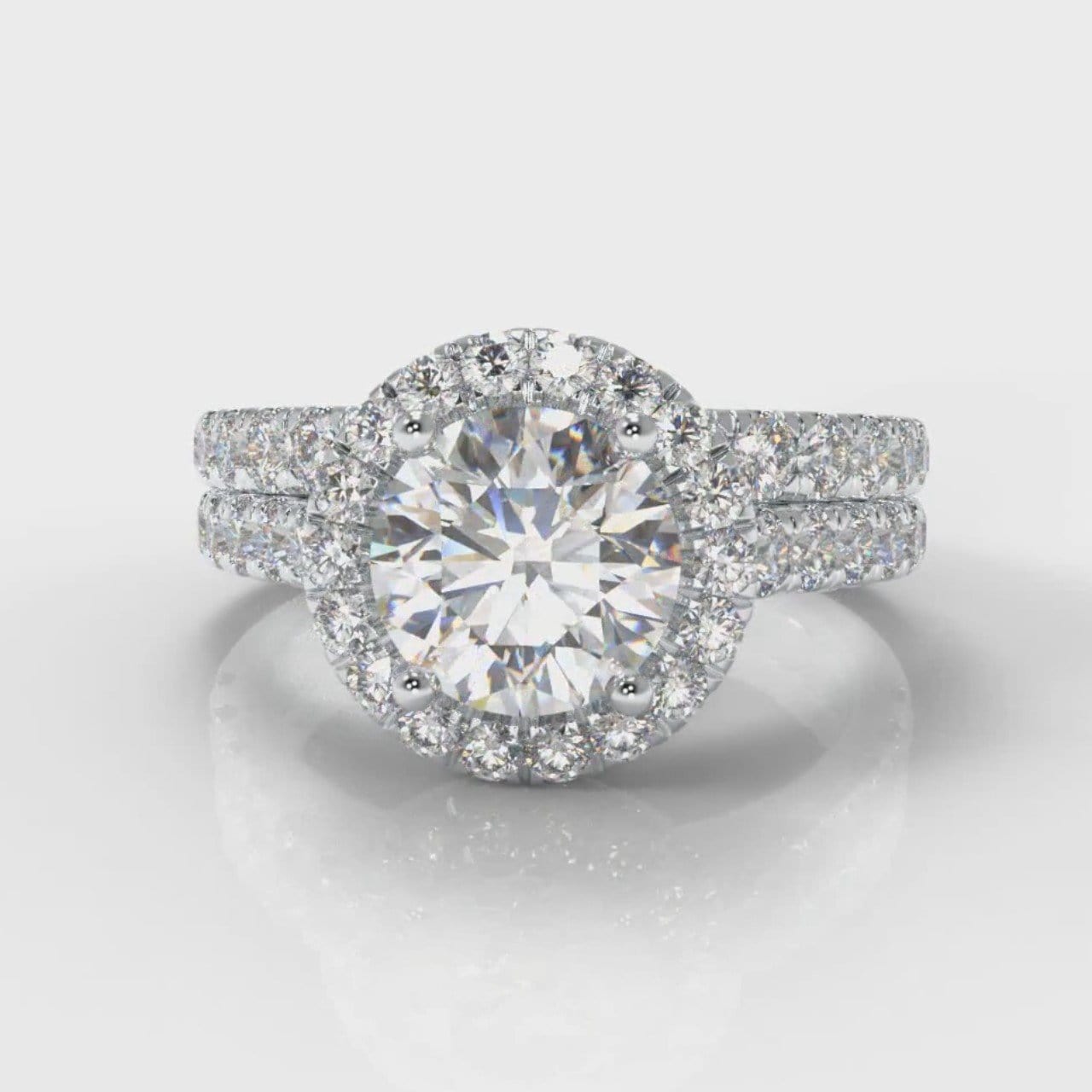 Micropavé Round Brilliant Cut Diamond Halo Bridal Set