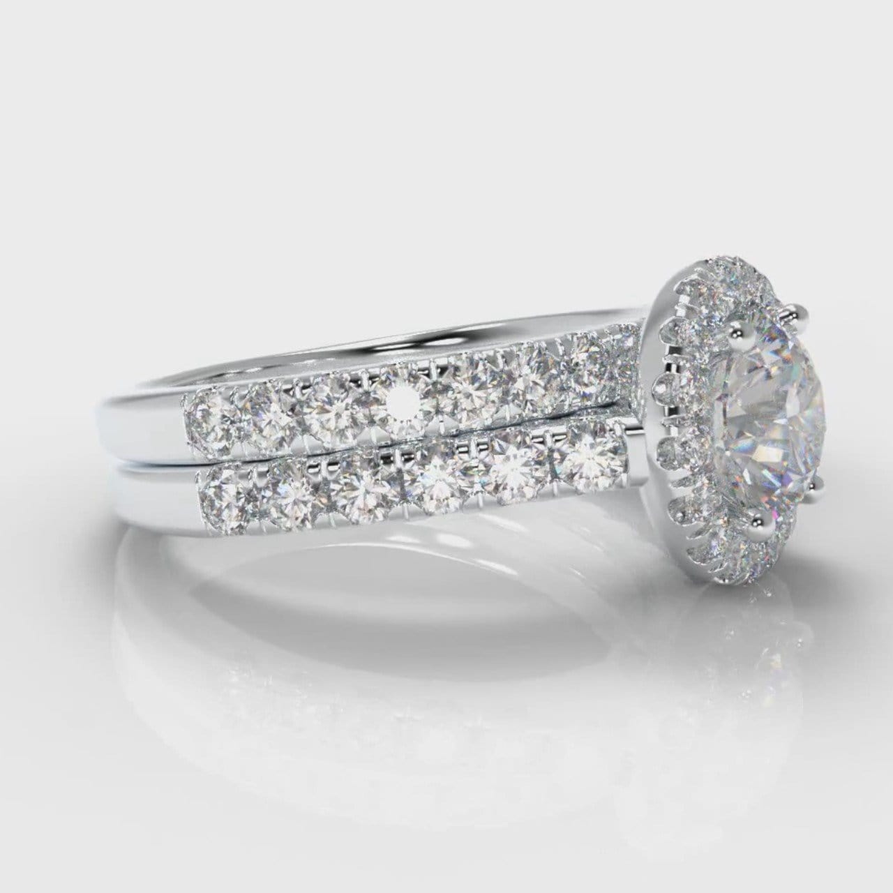 Micropavé Round Brilliant Cut Diamond Halo Bridal Set