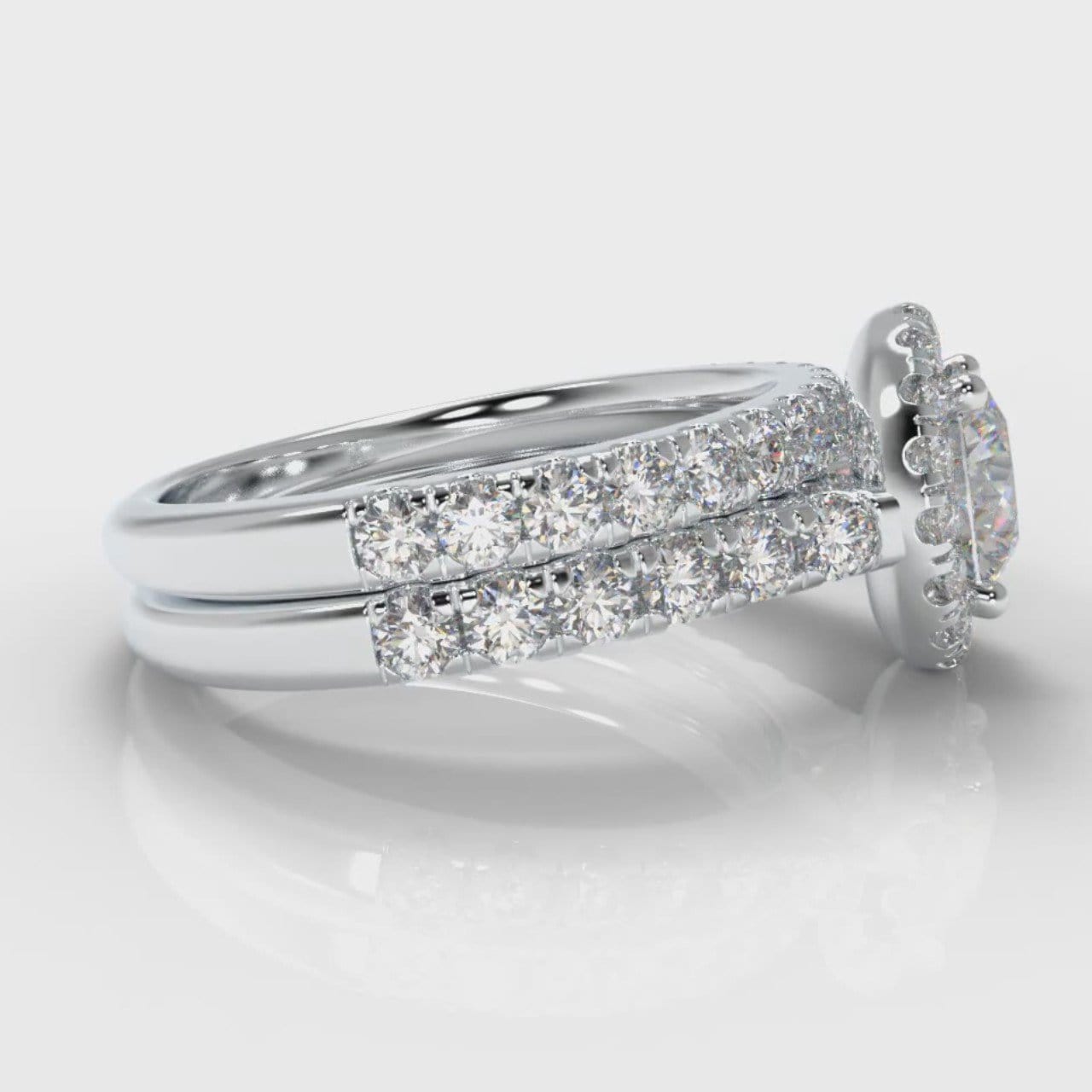 Micropavé Round Brilliant Cut Diamond Halo Bridal Set