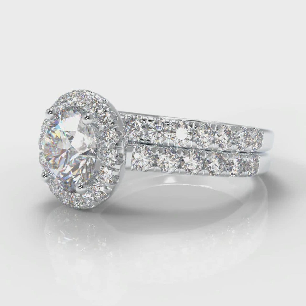 Micropavé Round Brilliant Cut Diamond Halo Bridal Set