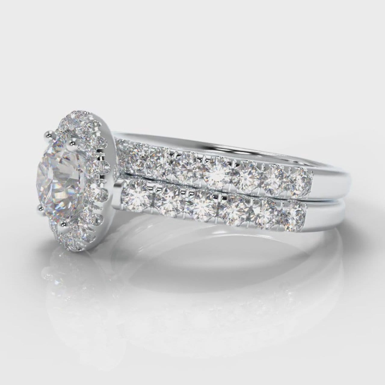 Micropavé Round Brilliant Cut Diamond Halo Bridal Set