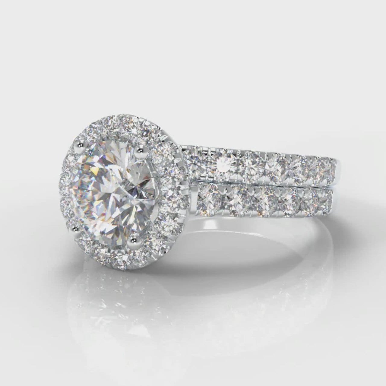 Micropavé Round Brilliant Cut Diamond Halo Bridal Set