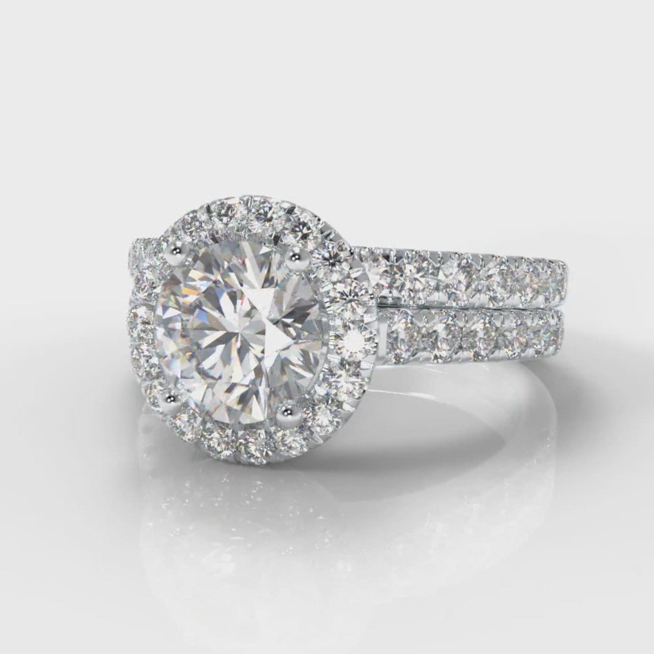 Micropavé Round Brilliant Cut Diamond Halo Bridal Set