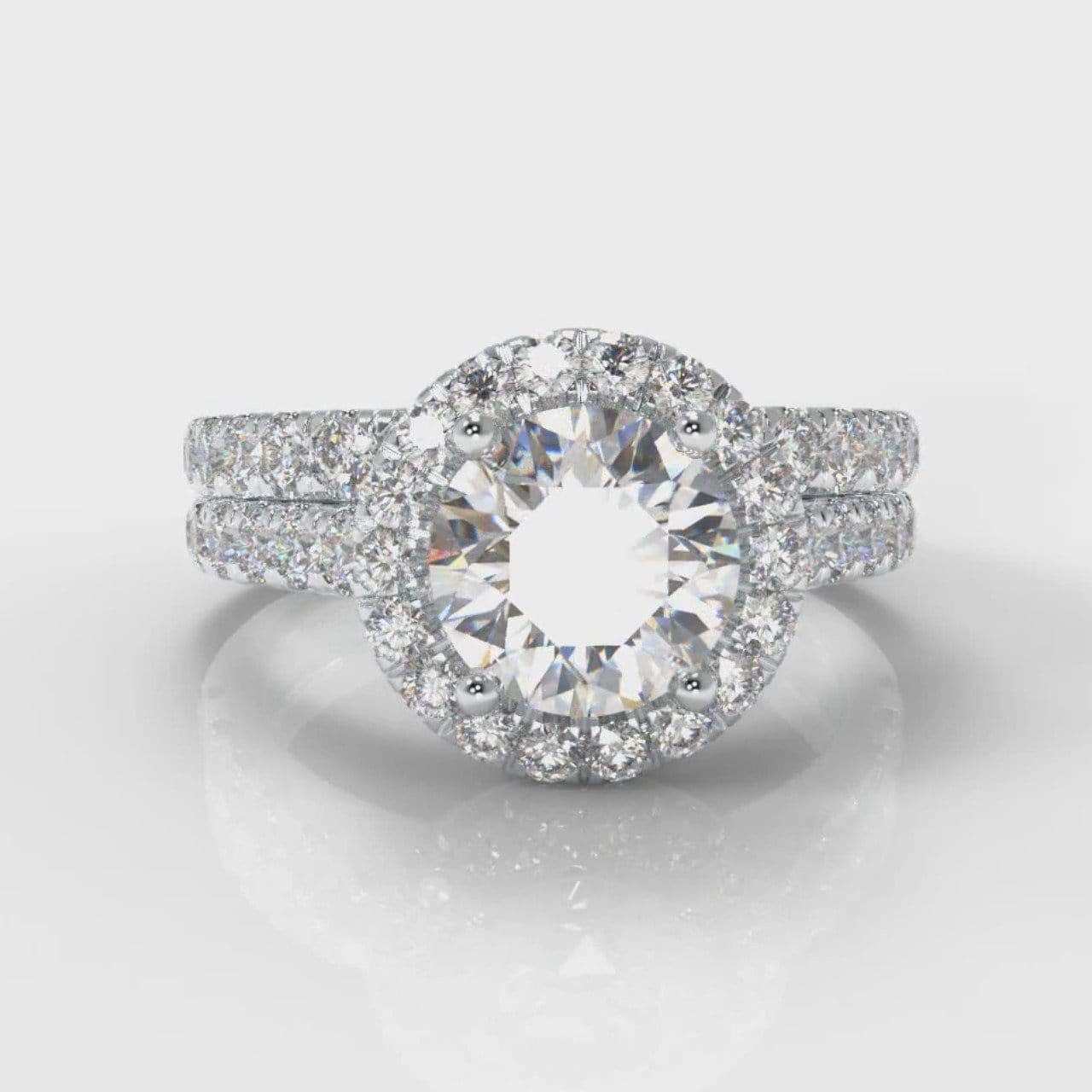 Micropavé Round Brilliant Cut Diamond Halo Bridal Set