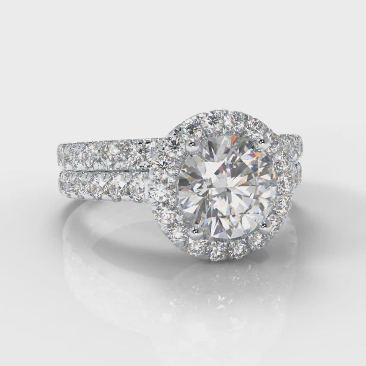 Micropavé Round Brilliant Cut Diamond Halo Bridal Set