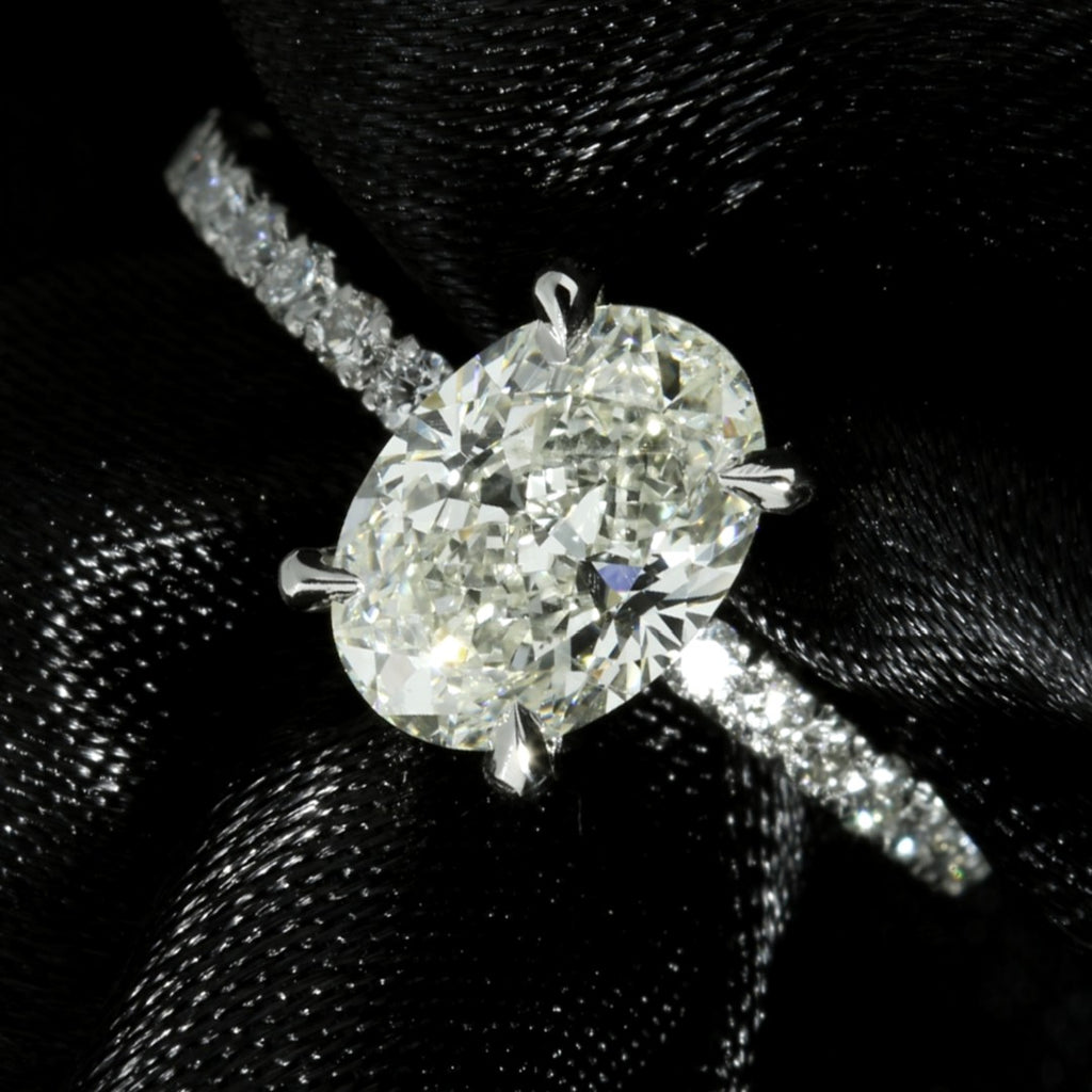 Petite Micropavé Oval Diamond Engagement Ring