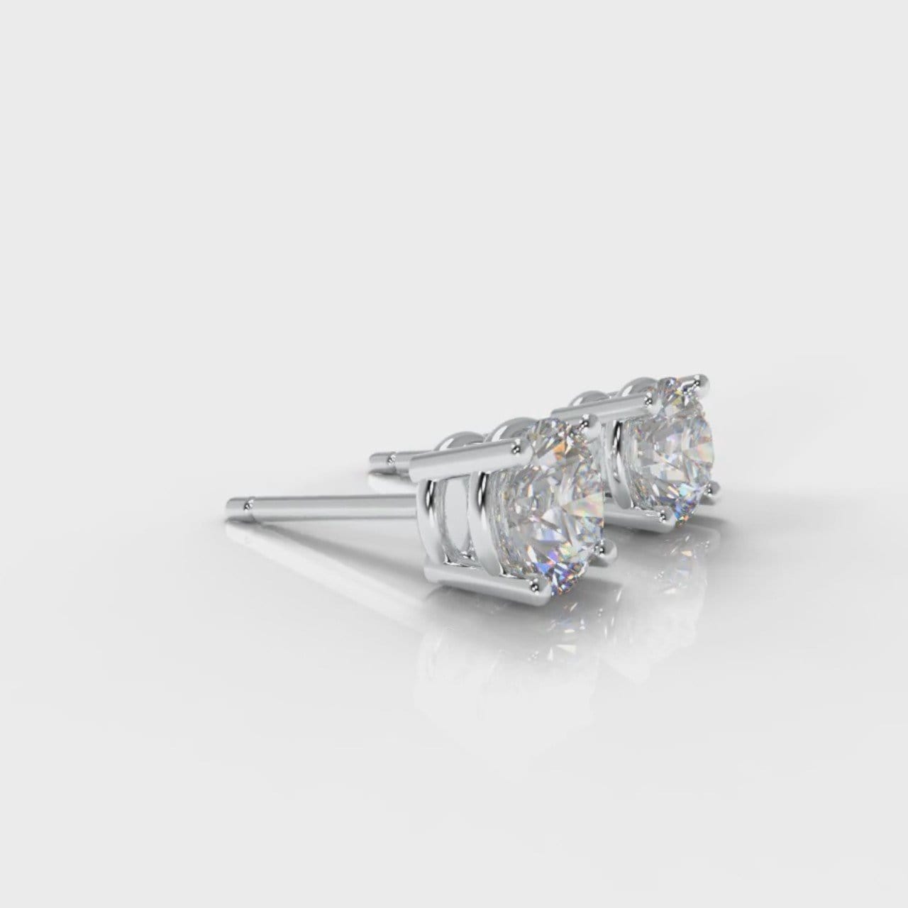 Four Claw Diamond Stud Earrings (GIA Certified)