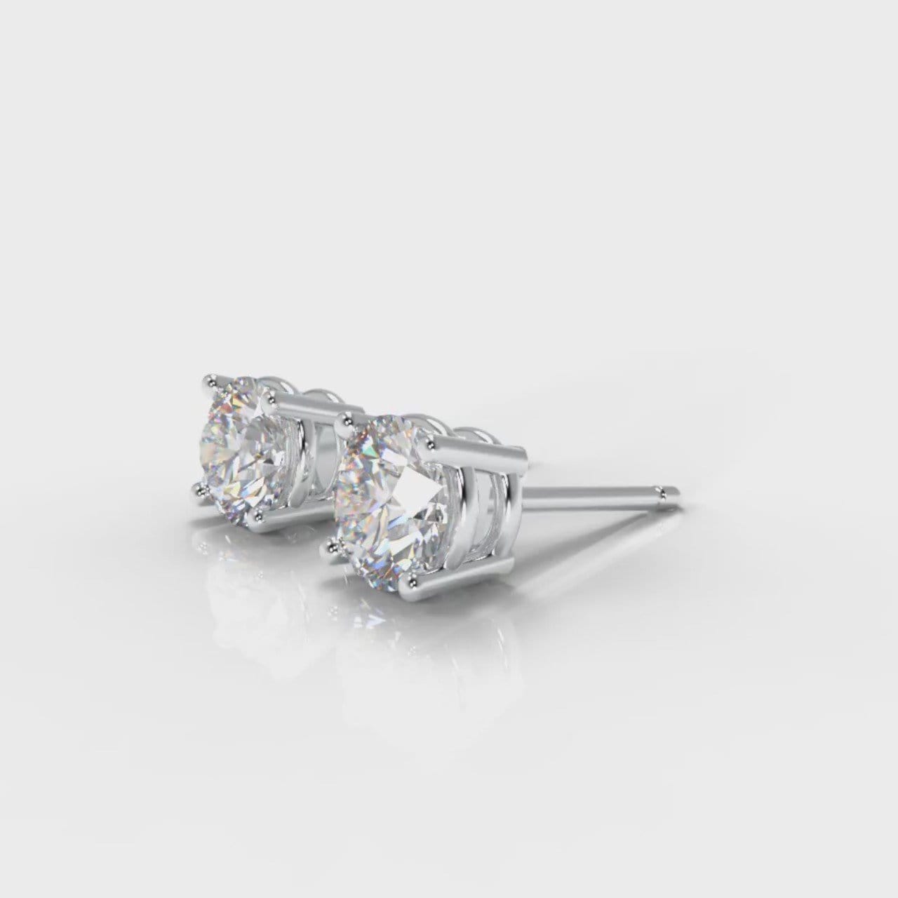 Four Claw Diamond Stud Earrings (GIA Certified)