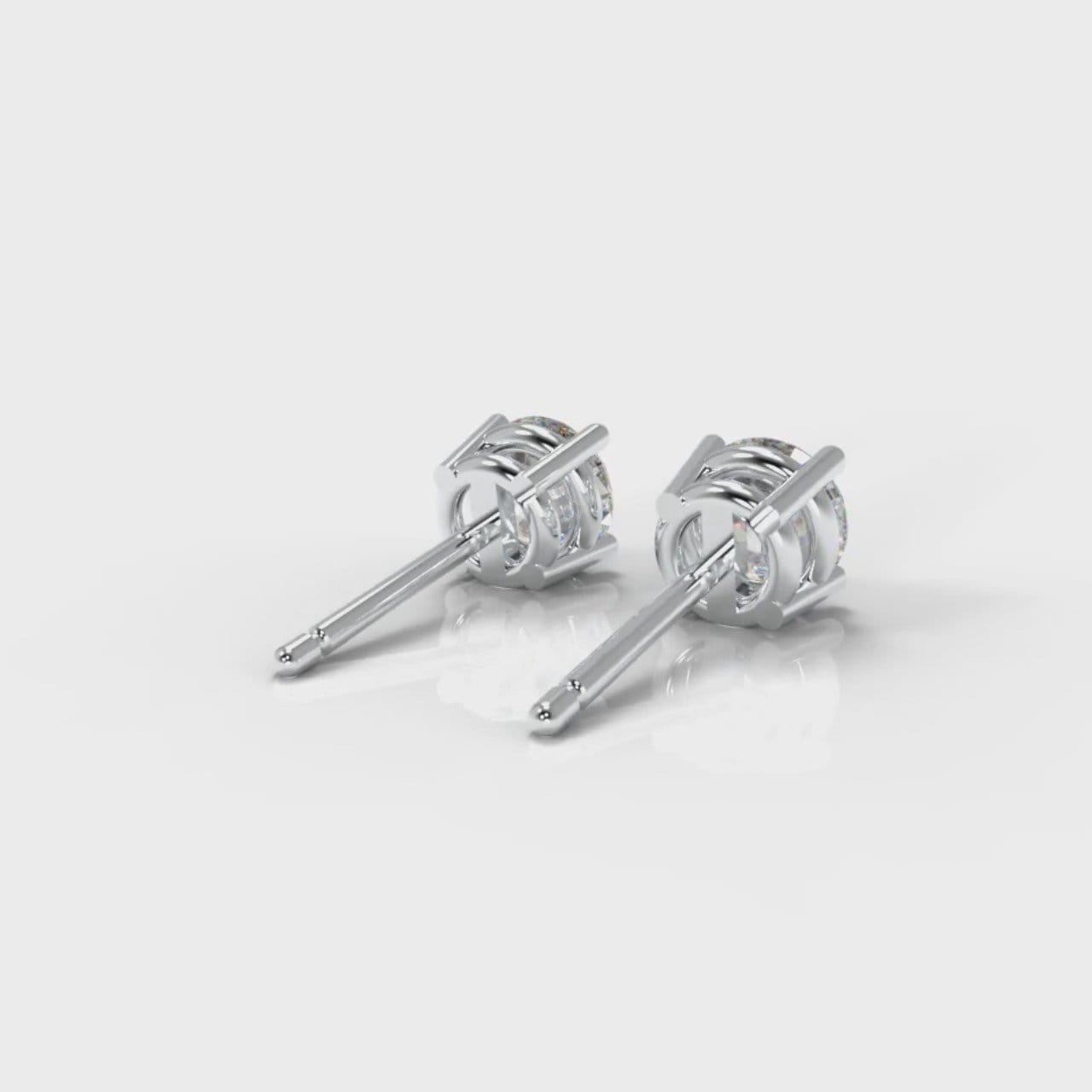 Four Claw Diamond Stud Earrings (GIA Certified)