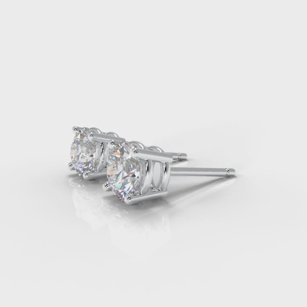 Four Claw Diamond Stud Earrings (GIA Certified)