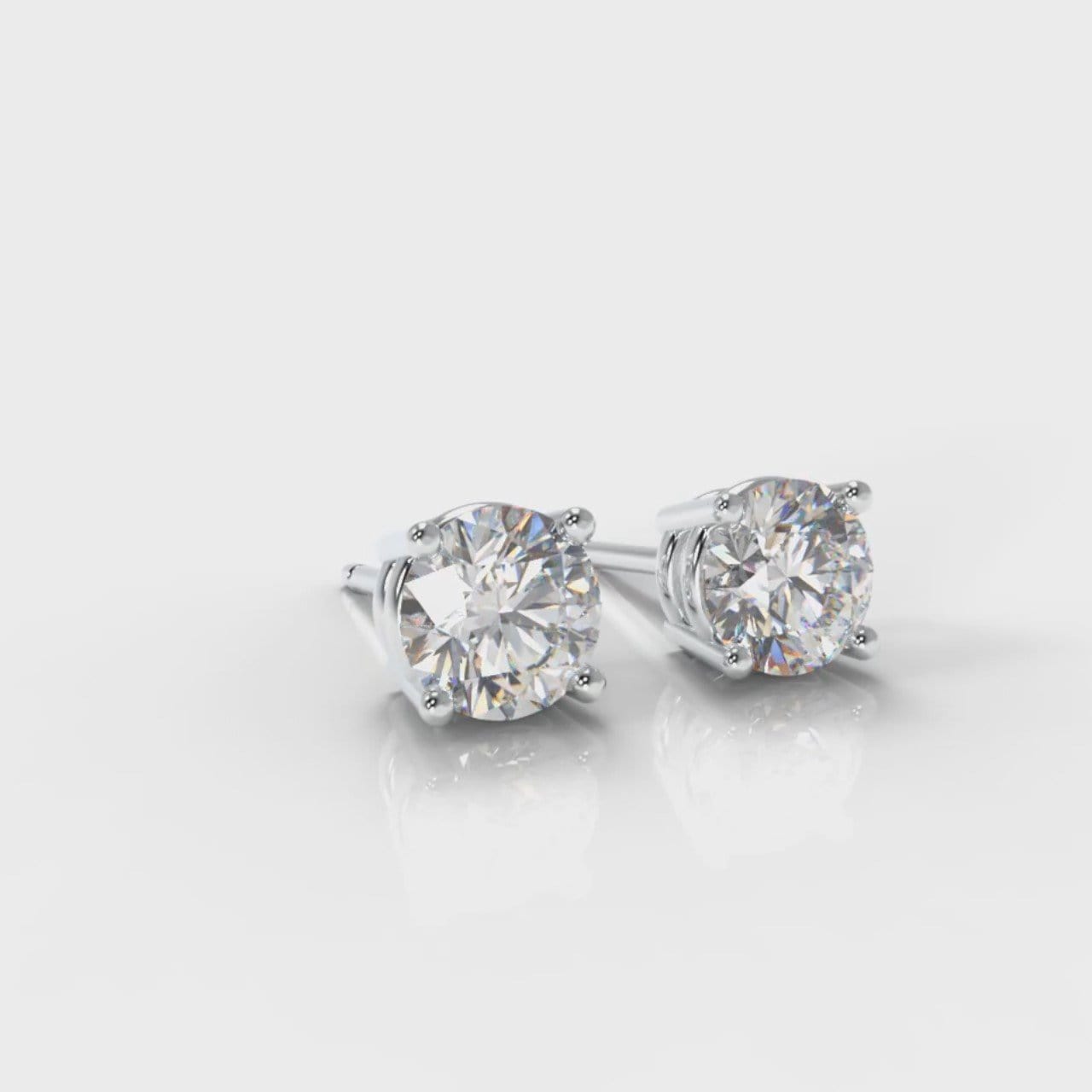 Four Claw Diamond Stud Earrings (GIA Certified)