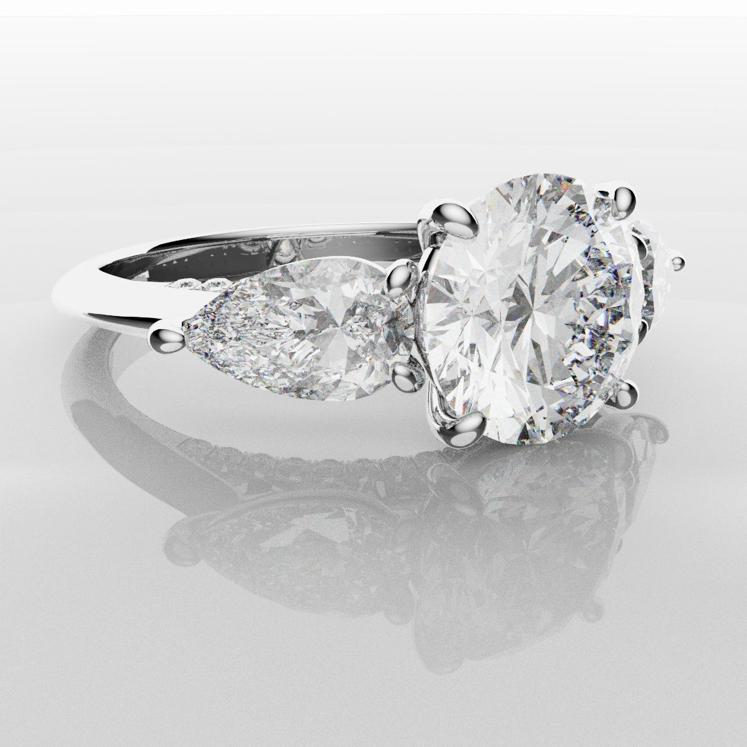 Round and Pear Trilogy Engagement Ring with Diamond Set Cathedral