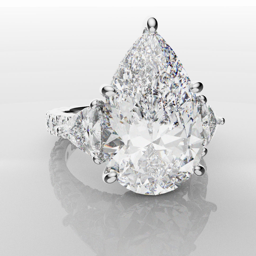 Pear and Trilliant Diamond Trilogy Engagement Ring - With Hidden Halo Detailing