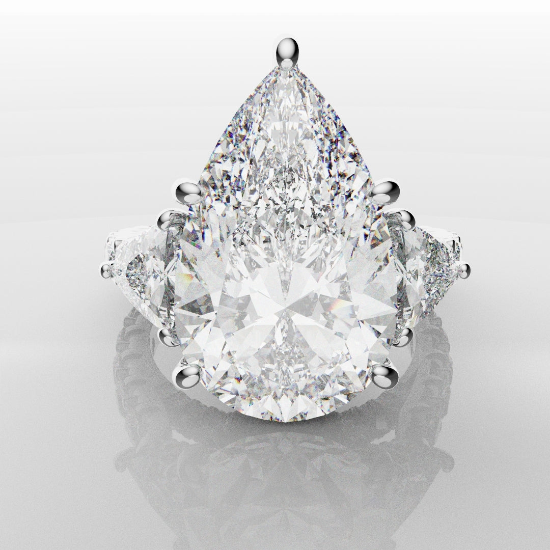 Pear and Trilliant Diamond Trilogy Engagement Ring - With Hidden Halo Detailing