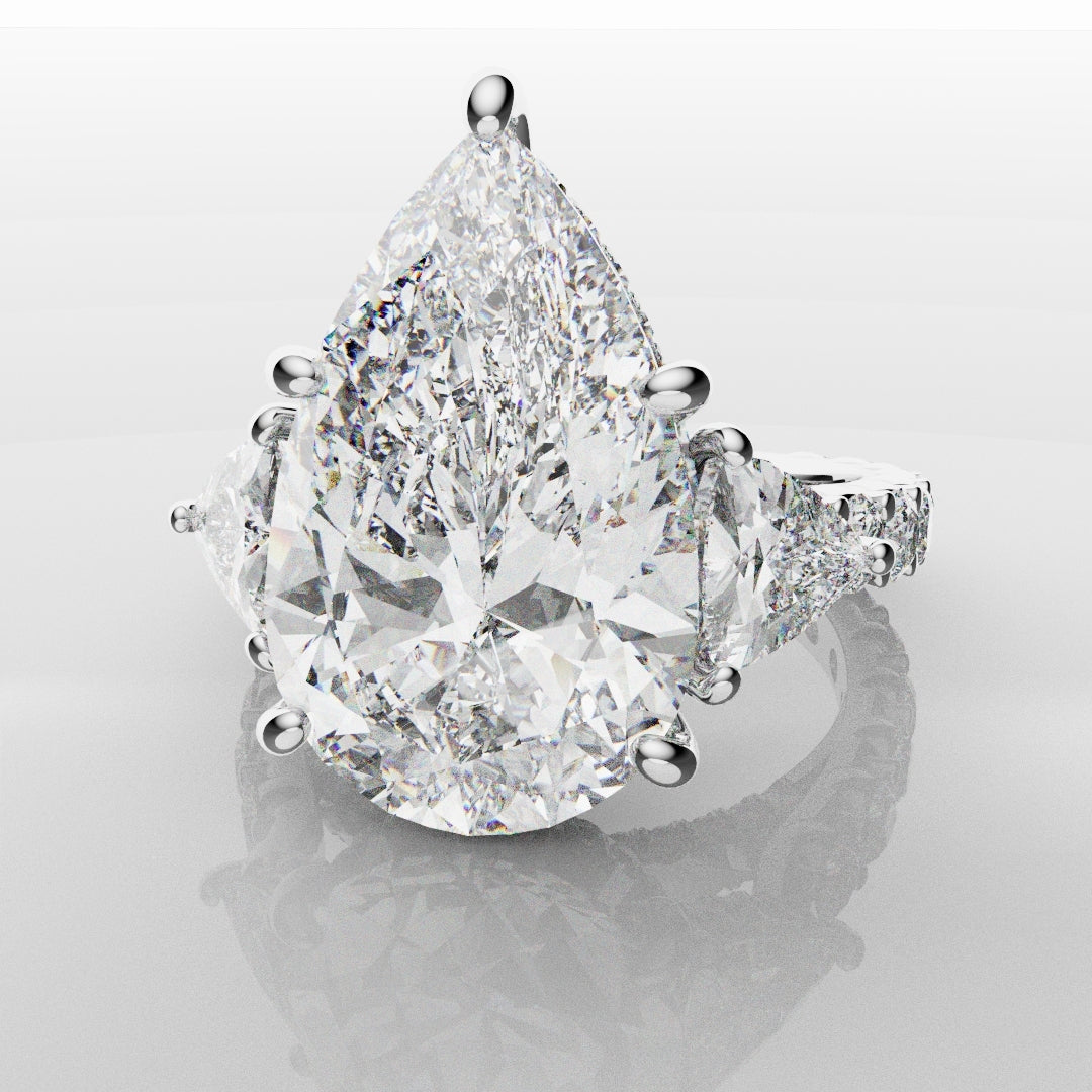Pear and Trilliant Diamond Trilogy Engagement Ring - With Hidden Halo Detailing