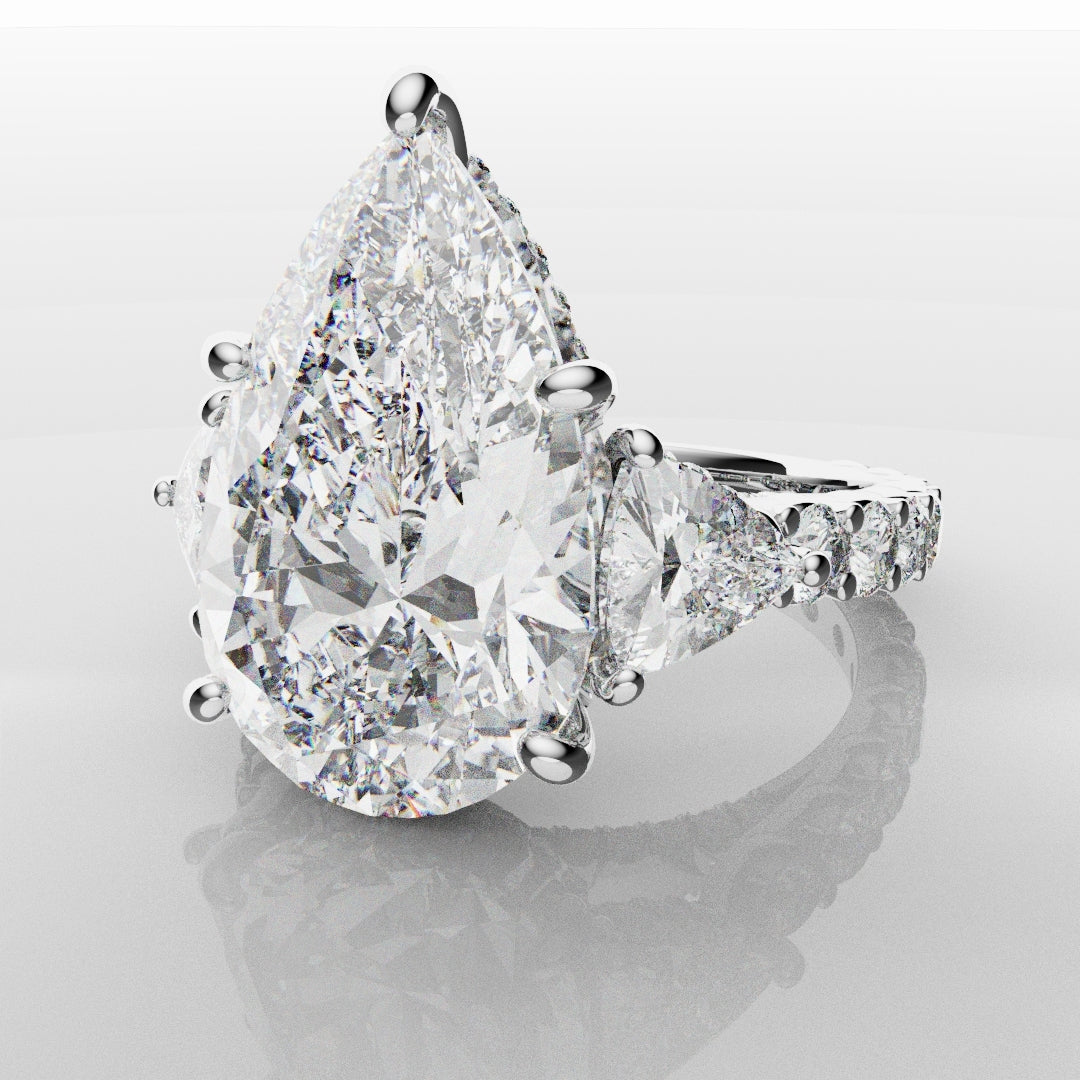 Pear and Trilliant Diamond Trilogy Engagement Ring - With Hidden Halo Detailing