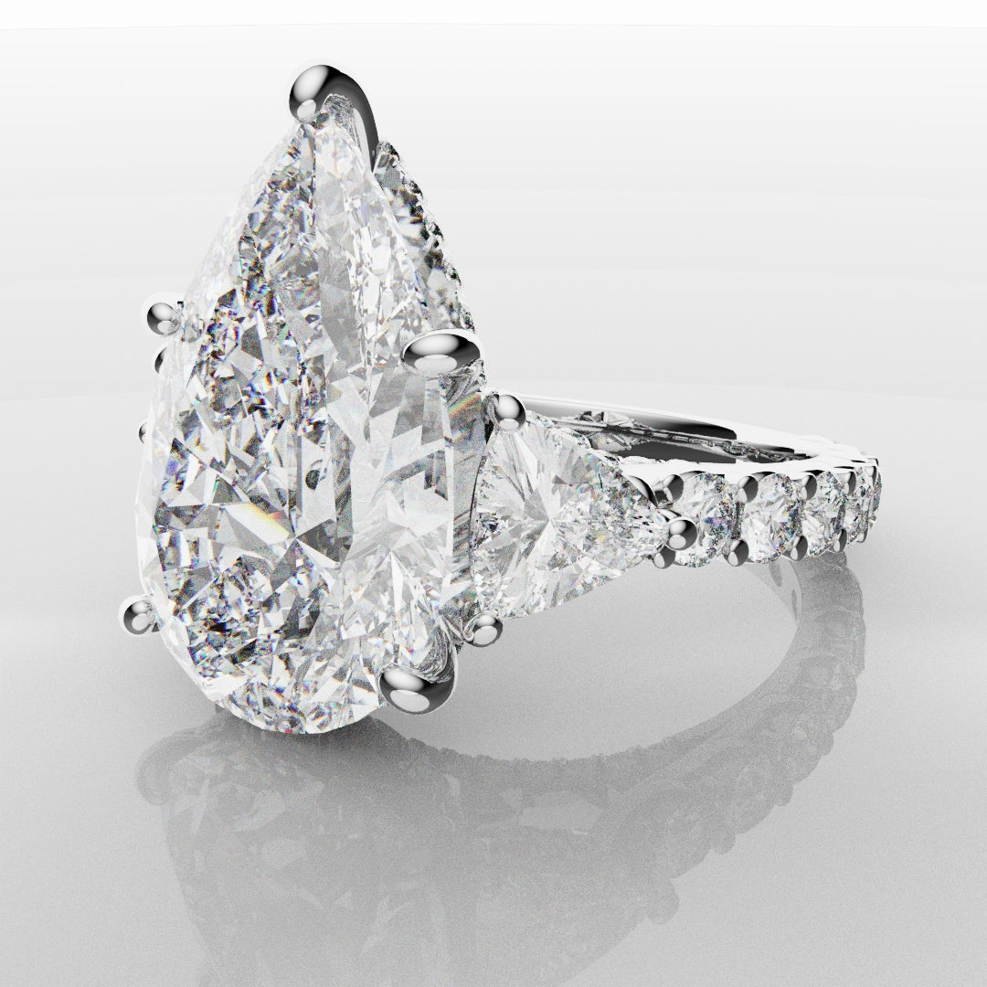 Pear and Trilliant Diamond Trilogy Engagement Ring - With Hidden Halo Detailing