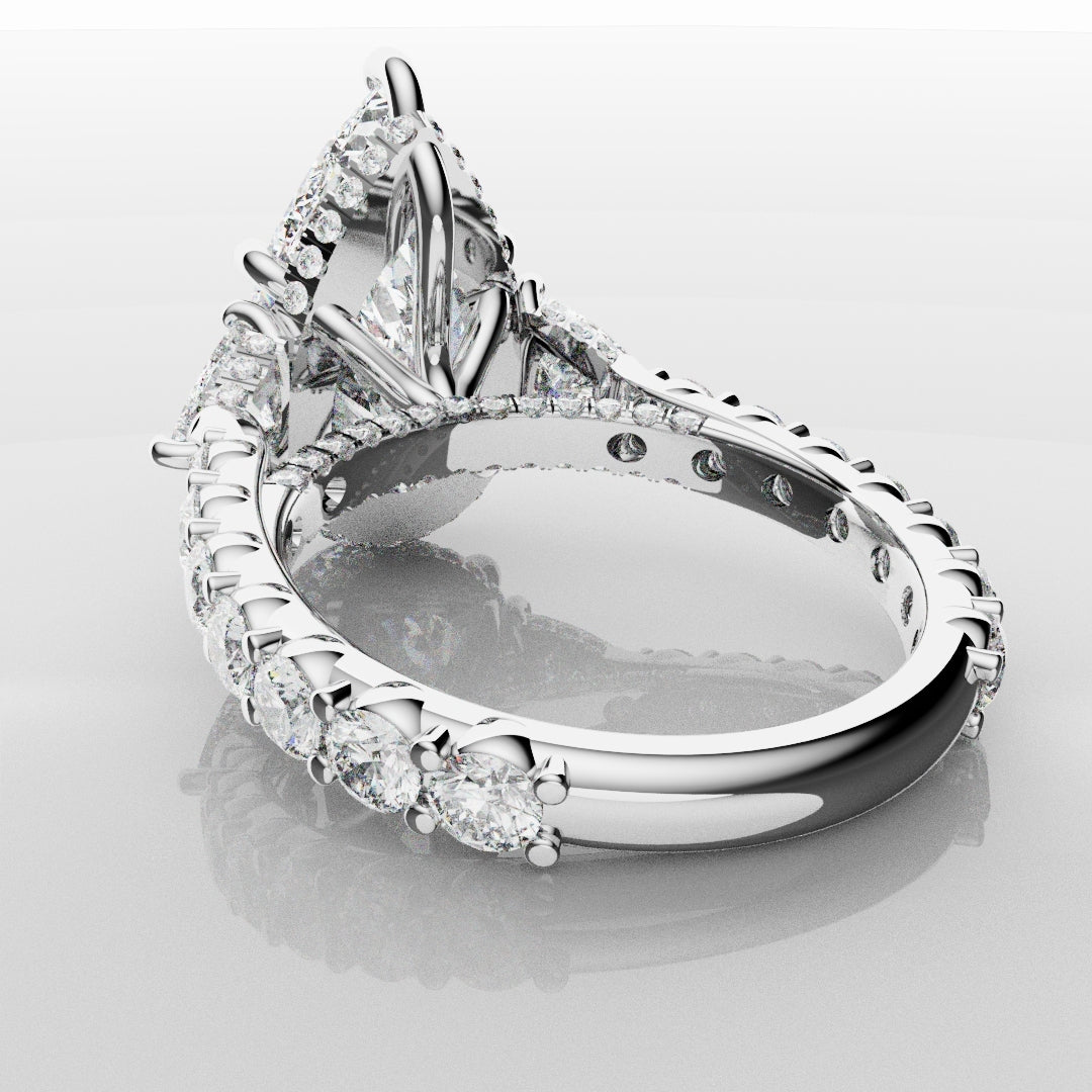 Pear and Trilliant Diamond Trilogy Engagement Ring - With Hidden Halo Detailing