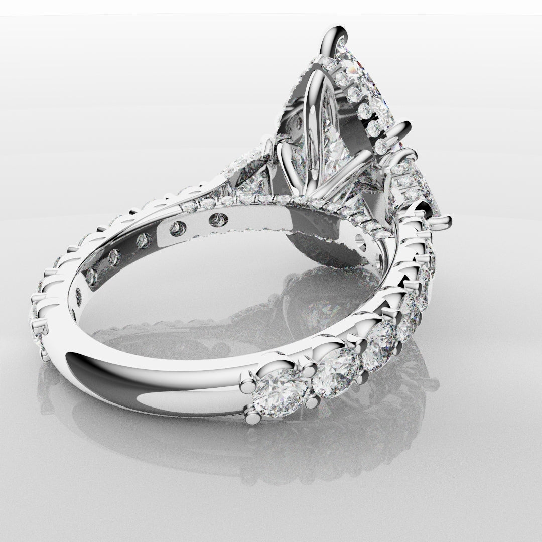 Pear and Trilliant Diamond Trilogy Engagement Ring - With Hidden Halo Detailing