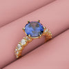 round blue sapphire engagement ring