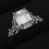 emerald cut diamond ring with marquise accent shoulders