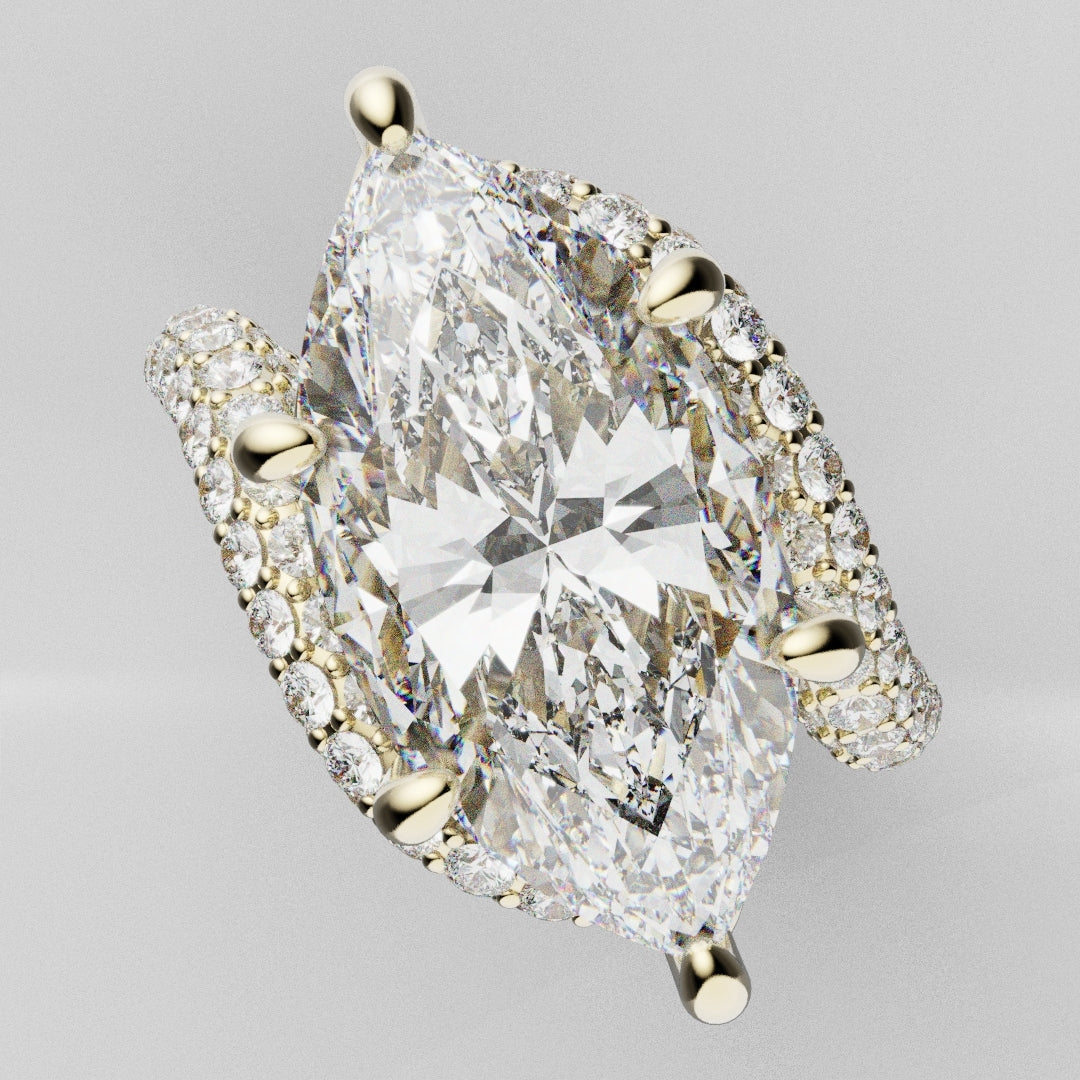 High-end marquise diamond engagement ring with sparkling micro pavé detailing and hidden halo craftsmanship.