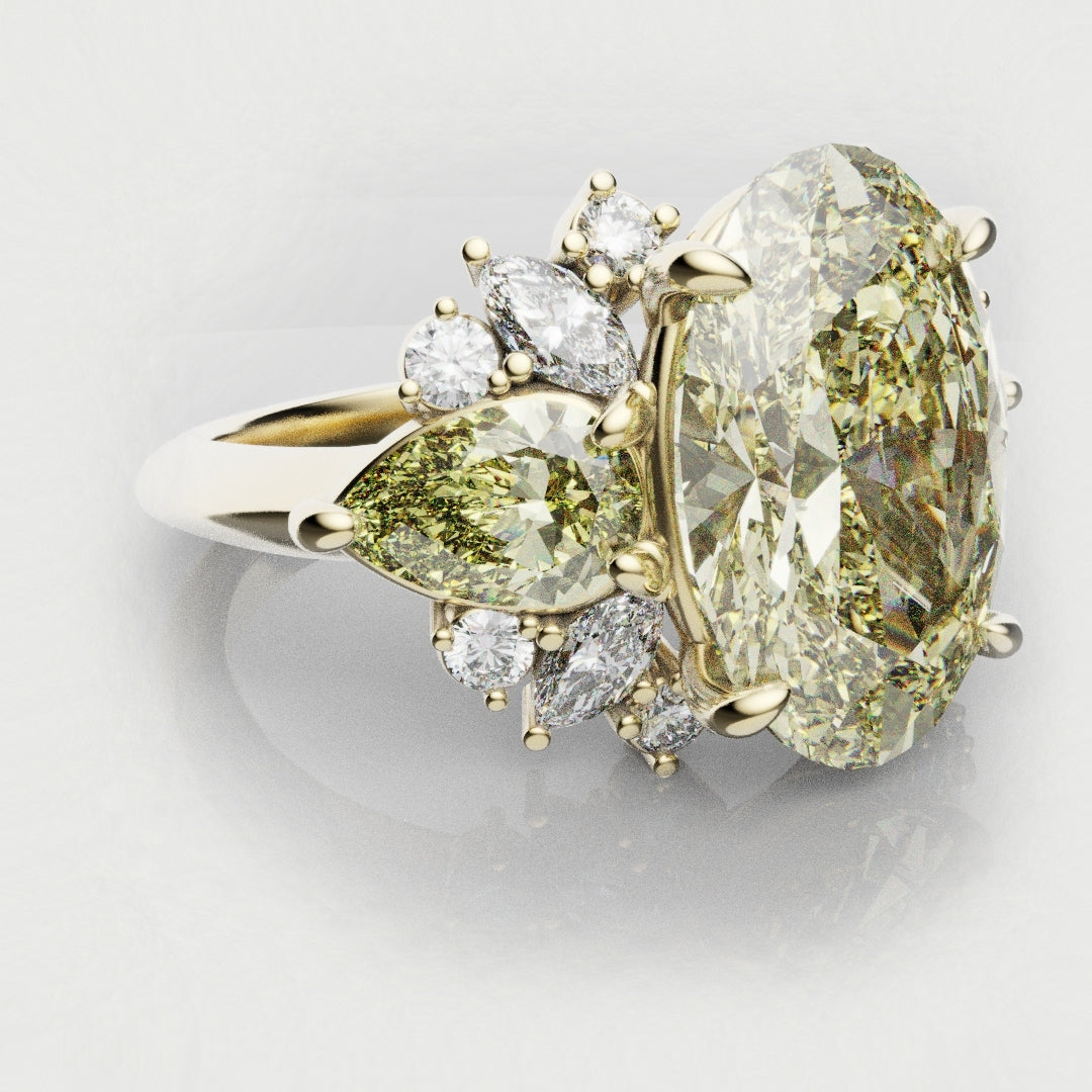 Gold ring with large yellow diamond and smaller white diamonds on a light gray background