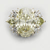 6ct fancy yellow oval diamond engagement ring in 18ct yellow gold with pear shaped yellow accent diamonds