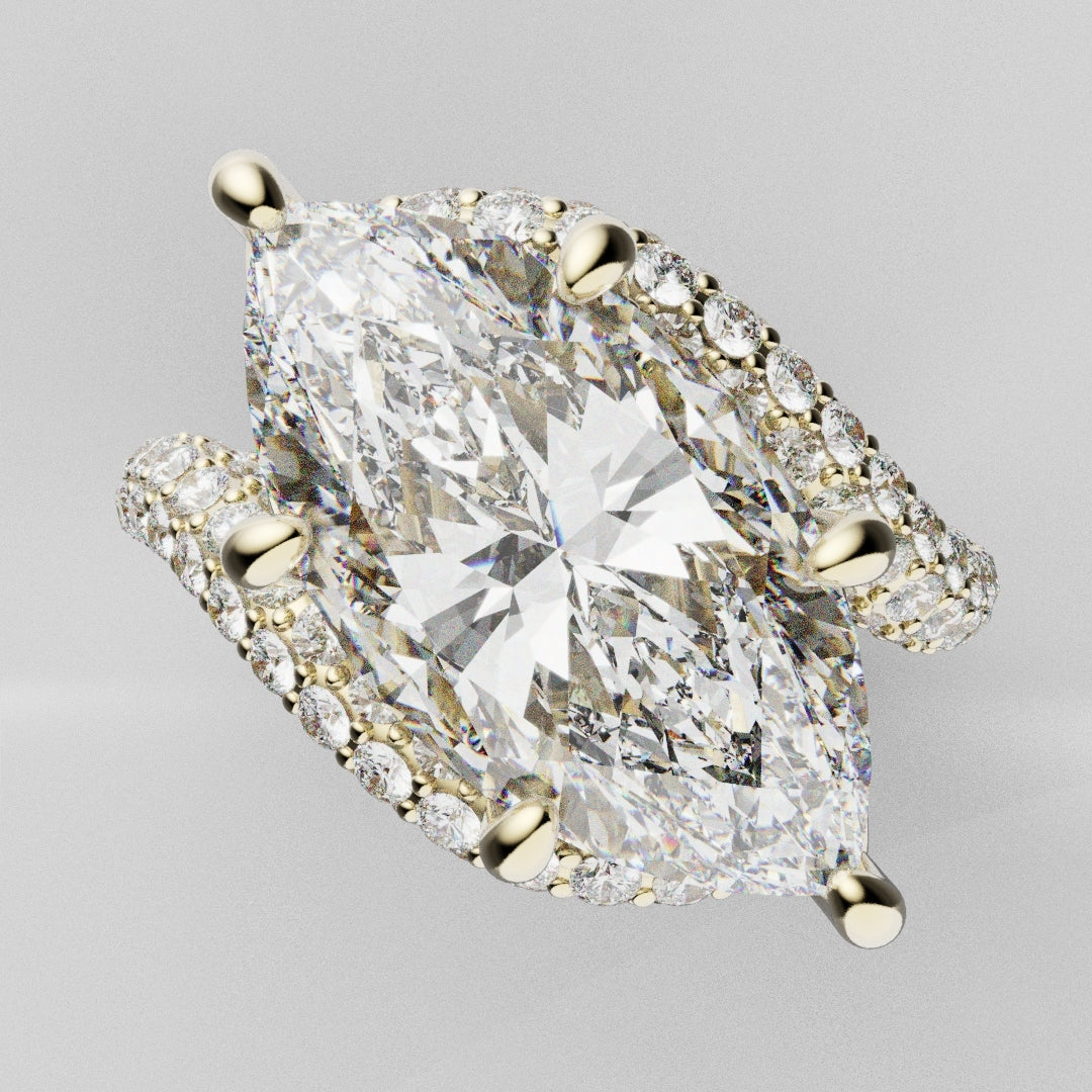 Artisan-crafted marquise diamond ring with hidden halo, pink and green sapphires, and 18ct yellow gold micro pavé band.